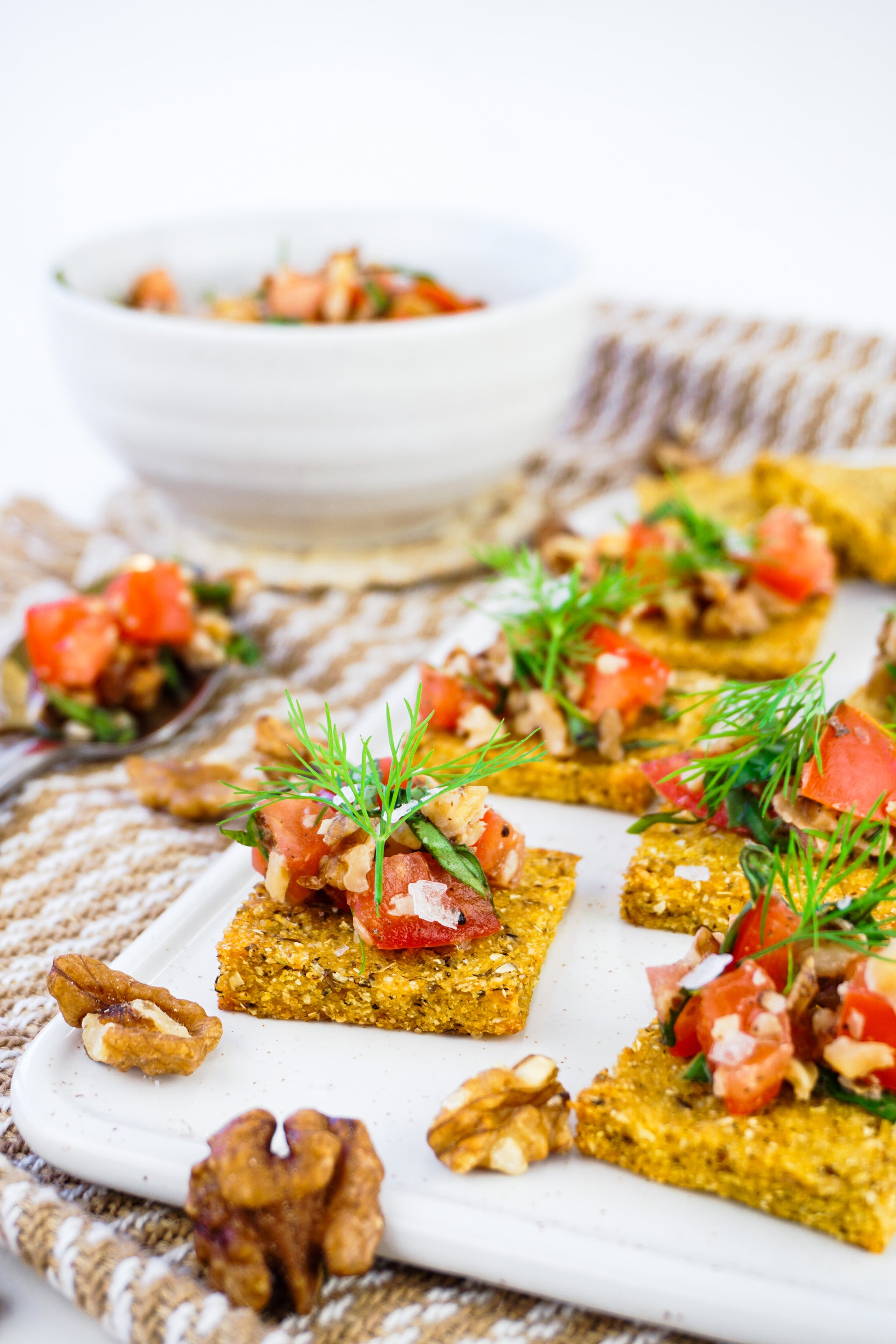 Crispy Polenta Bites With A Fresh Tomato And Walnut Topping